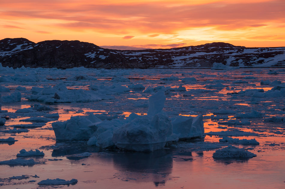 Icebergs under the Midnight Sun in Ilulissat, Greenland
