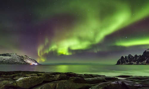 Northern Lights looking out to Steinfjord on Senja island, Norway