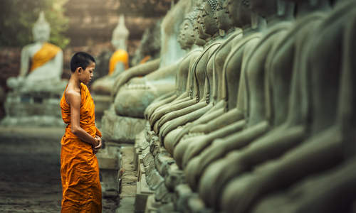 Novice monk practising Vipassana meditation, Laos