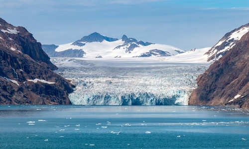 Large glacier meeting the waters of Prince Christian Sound in Greenland 
